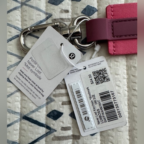 Lululemon Never Lost Keychain in Sakura Pink - Picture 2 of 2